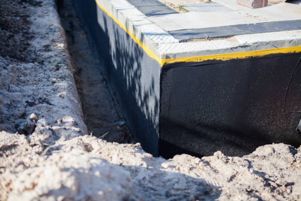 Professional Basement Waterproofing technician working in Gatlinburg, TN